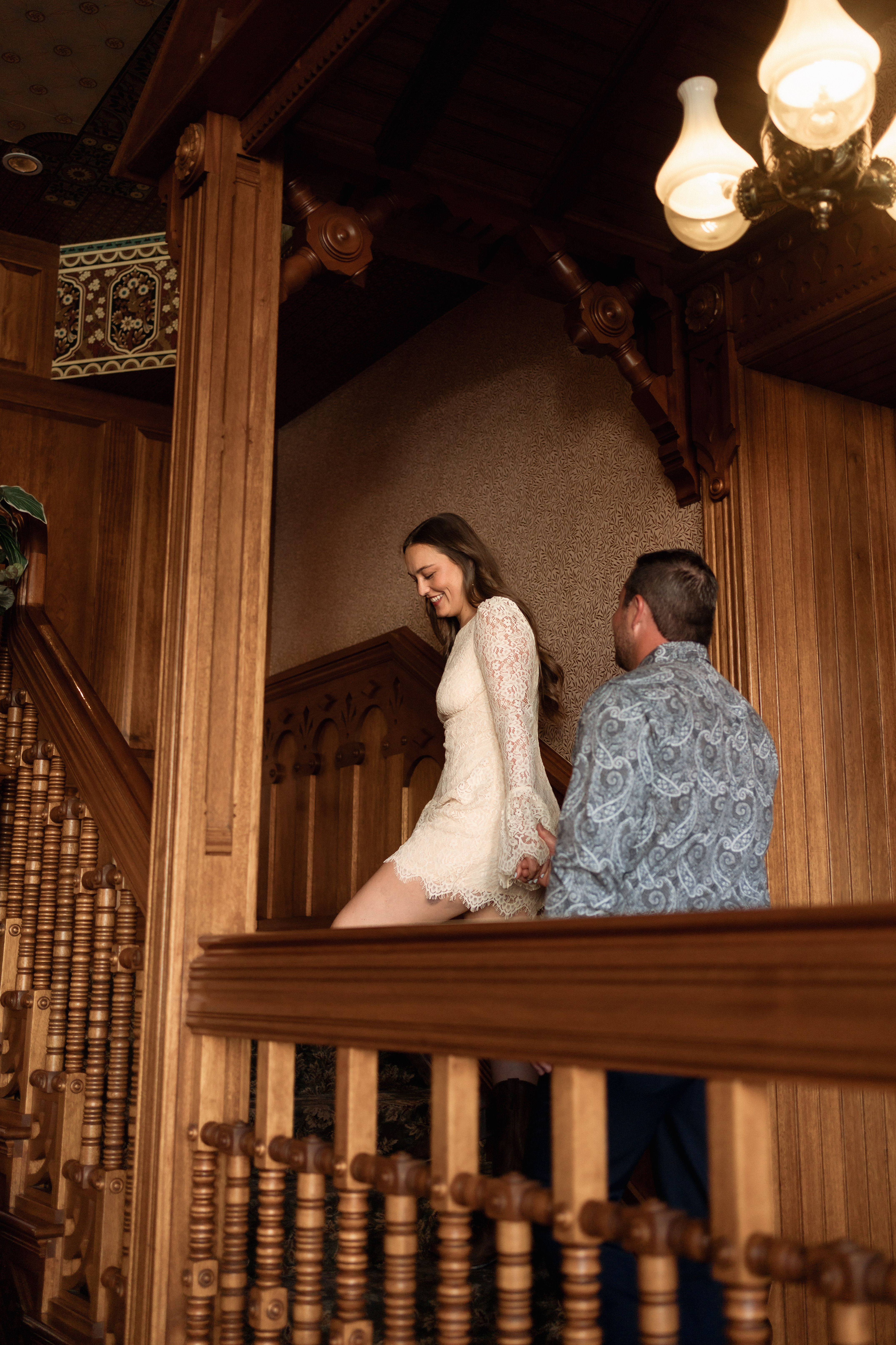 Katherine and Gavin by the bookshelf